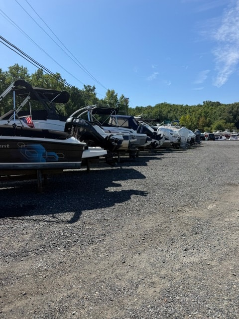 Marine technician performing engine service and repairs at Flying Point Marina
